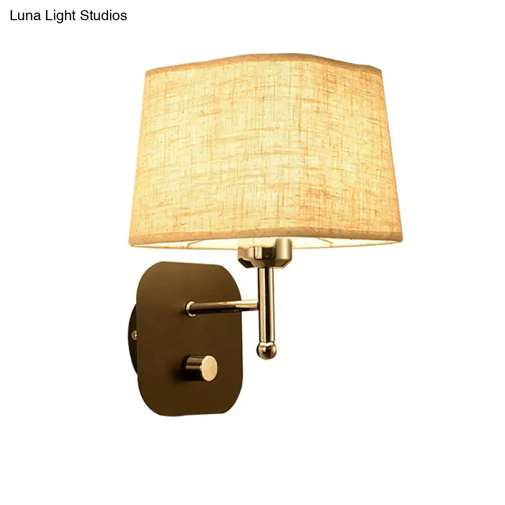 Modern brass and beige linen wall sconce lighting with textured lampshade ideal for bedroom sconce lighting