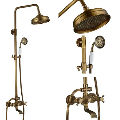 Antique brass-finished shower faucet set with dual handle mixer valve and white ceramic handheld spray nozzle