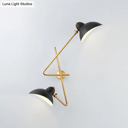 Black and brass metal duckbill wall sconce with sleek angular design modern wall sconce lamp for living room