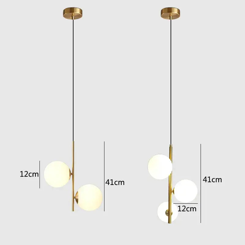 Modern brass pendant light with three frosted glass ball spheres and black cords for dining room decorbites glass ball