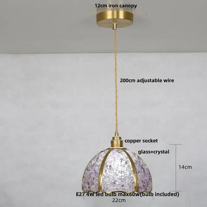 Modern brass and blue crystal glass pendant light fixture with a lavender dome-shaped shade suspended by gold frames