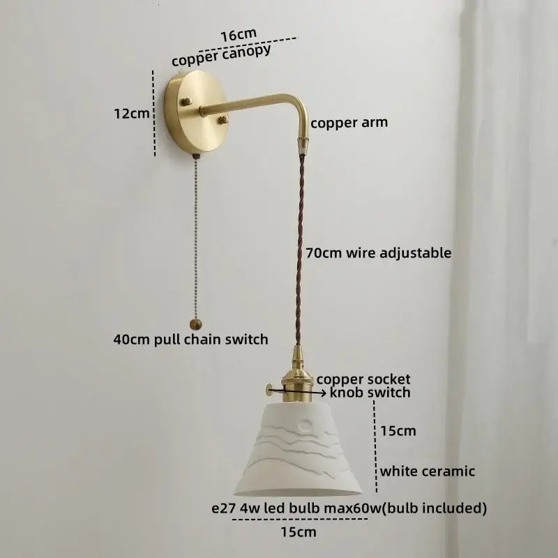 A modern wall lamp featuring a white ceramic copper led lampshade with a wave texture on a brass arm by decorbites