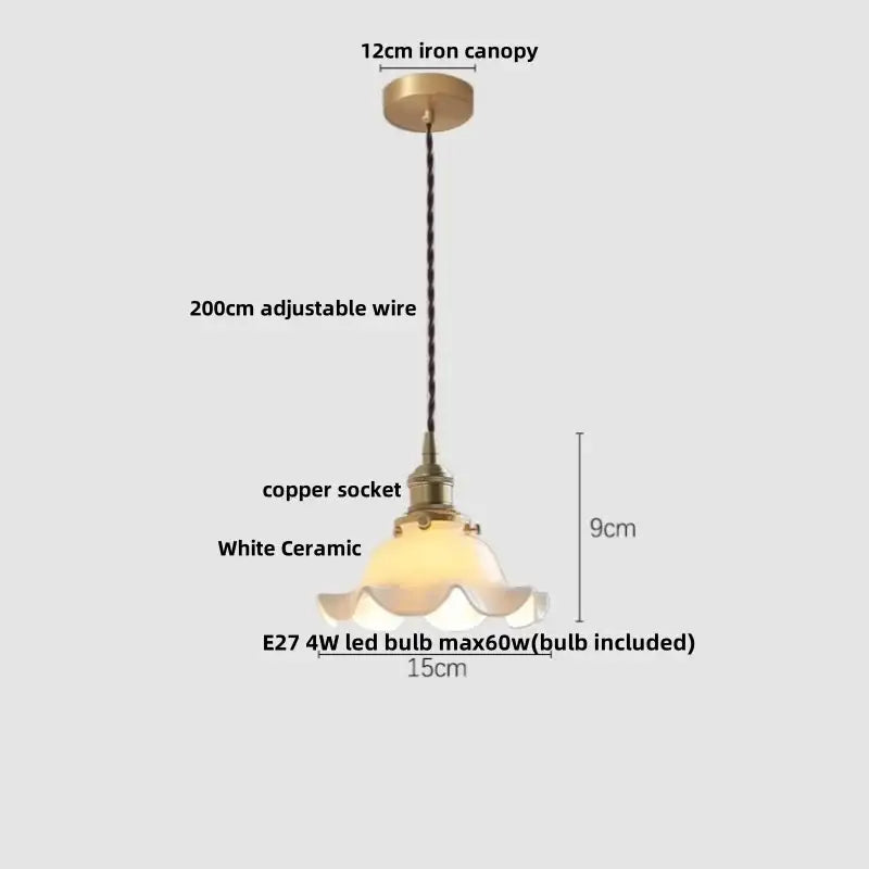 Modern brass and clear glass led pendant lamp with brass canopy, copper socket, and white ceramic shade for dining room decorbites clear glass