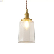 Modern brass and clear glass led pendant lamp with warm-toned brass finish and decorbites clear glass shade for dining room
