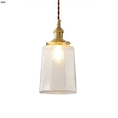 Modern brass and clear glass led pendant lamp with warm-toned brass finish and decorbites clear glass shade for dining room