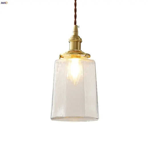Modern brass and clear glass led pendant lamp with warm-toned brass finish and decorbites clear glass shade for dining room
