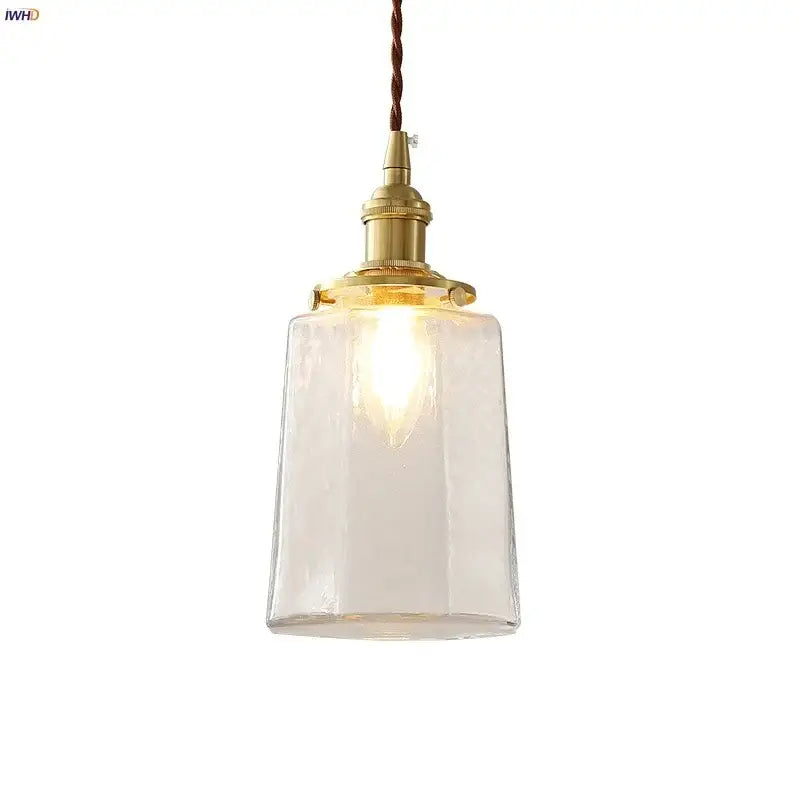 Modern brass and clear glass led pendant lamp with warm-toned brass finish and decorbites clear glass shade for dining room