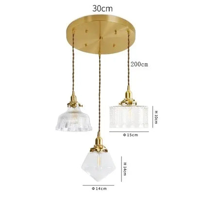 Modern brass pendant light with three clear glass led shades suspended by twisted chains for dining room decorbites clear glass