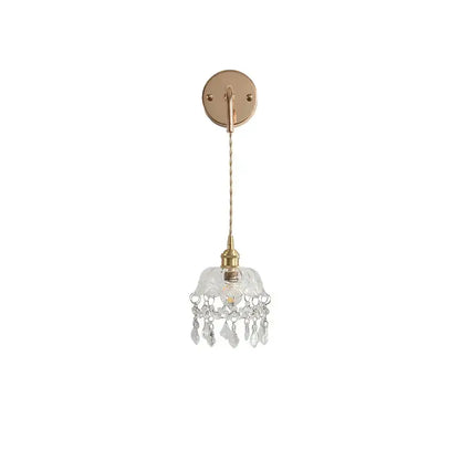 Modern brass wall lamp with clear glass shade and crystal droplets for elegant decorbites clear glass lighting decor