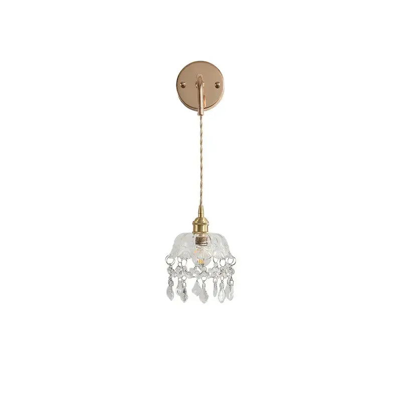 Modern brass wall lamp with clear glass shade and crystal droplets for elegant decorbites clear glass lighting decor