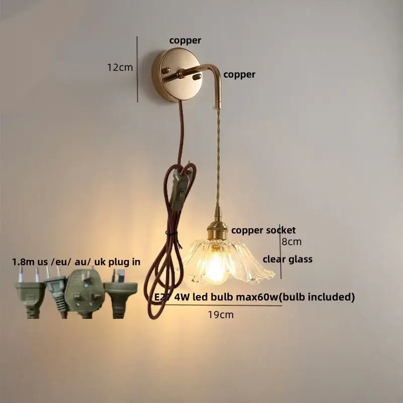 Modern brass wall lamp with copper sconce and clear glass flower-shaped shade for bedroom decorbites clear glass