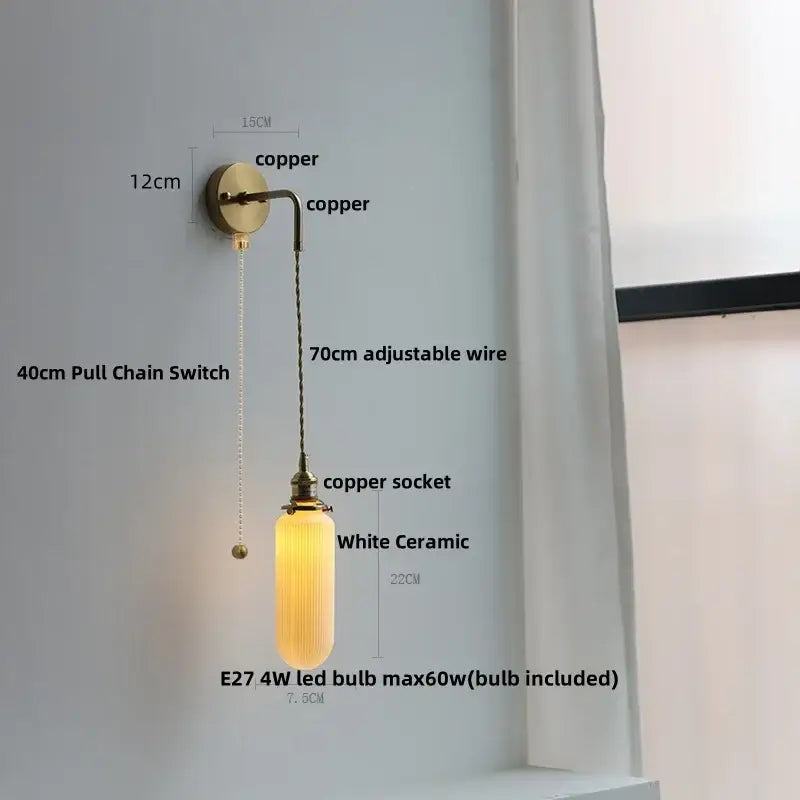 Modern brass wall lamp with clear glass shade and brass-finished copper mount by decorbites clear glass for bedroom decor