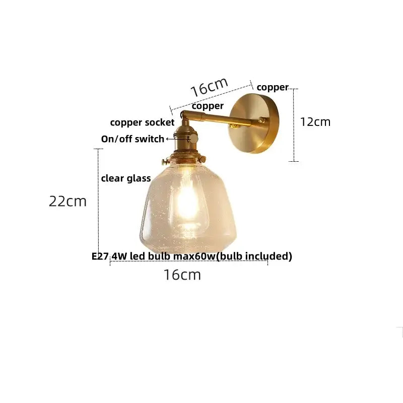 Modern brass wall lights featuring a copper finish and a clear glass shade for decorbites clear glass bedroom sconce