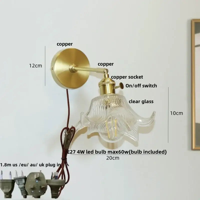 Modern brass and clear glass wall lights featuring a vintage-style bedroom sconce with a brass copper finish and clear glass shade decorbites clear glass