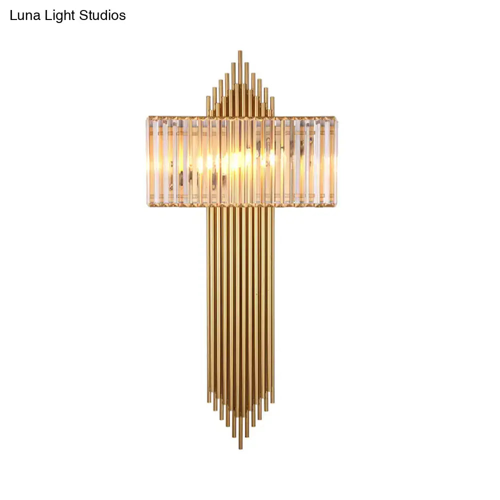 Modern brass and crystal rectangular wall lighting fixture with gold-toned finish and vertical crystal rods for bedroom