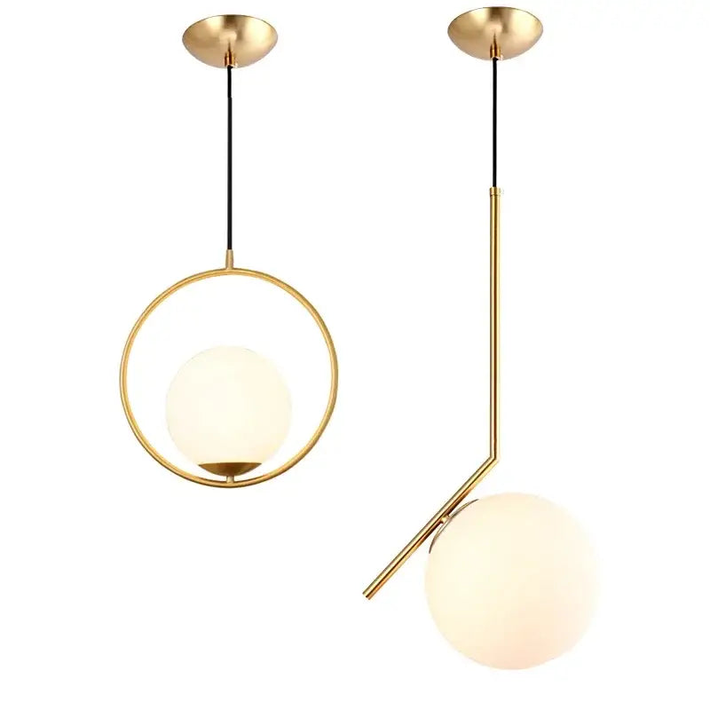 Modern brass and frosted glass ball pendant light with gold-finished spherical shades and geometric metal frames decorbites glass ball