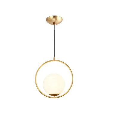 Modern brass and frosted glass ball pendant light with gold-toned circular frame for dining room light fixture decorbites glass ball