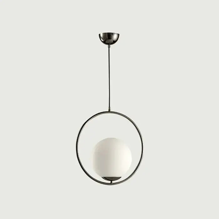 Modern brass and frosted glass ball pendant light with sleek black metal ring and opaque white globe decorbites glass ball light fixture