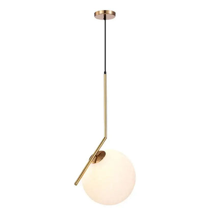 Modern brass and frosted glass ball pendant light featuring a sleek metal frame and opaque white glass shade by decorbites