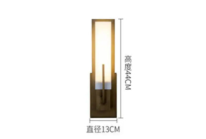 A modern brass and frosted glass led wall light with a rectangular vertical panel for stylish living room decorbites led wall lights