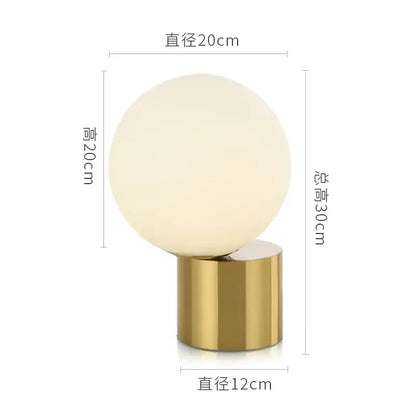 Modern brass and glass ball table lamp with frosted white glass ball and polished gold base for bedroom decorbites glass ball