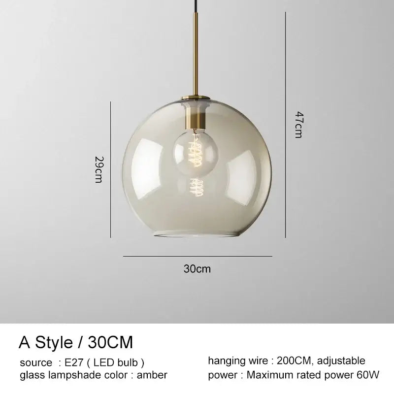 A modern brass and amber glass pendant light with e27 led bulb for kitchen and dining room chandelier