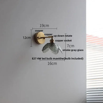 Modern brass and gray glass led wall sconce with copper finish and smoke gray glass shade for bedroom lighting