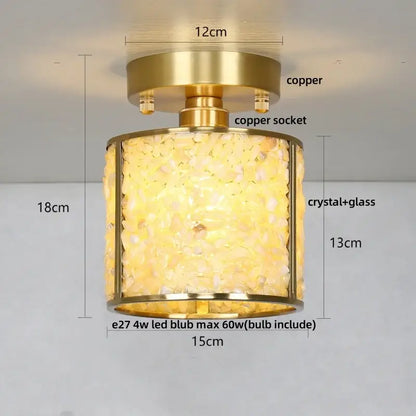 Modern brass and green decorbites crystal glass led ceiling light with crystal glass shards emitting warm yellow glow