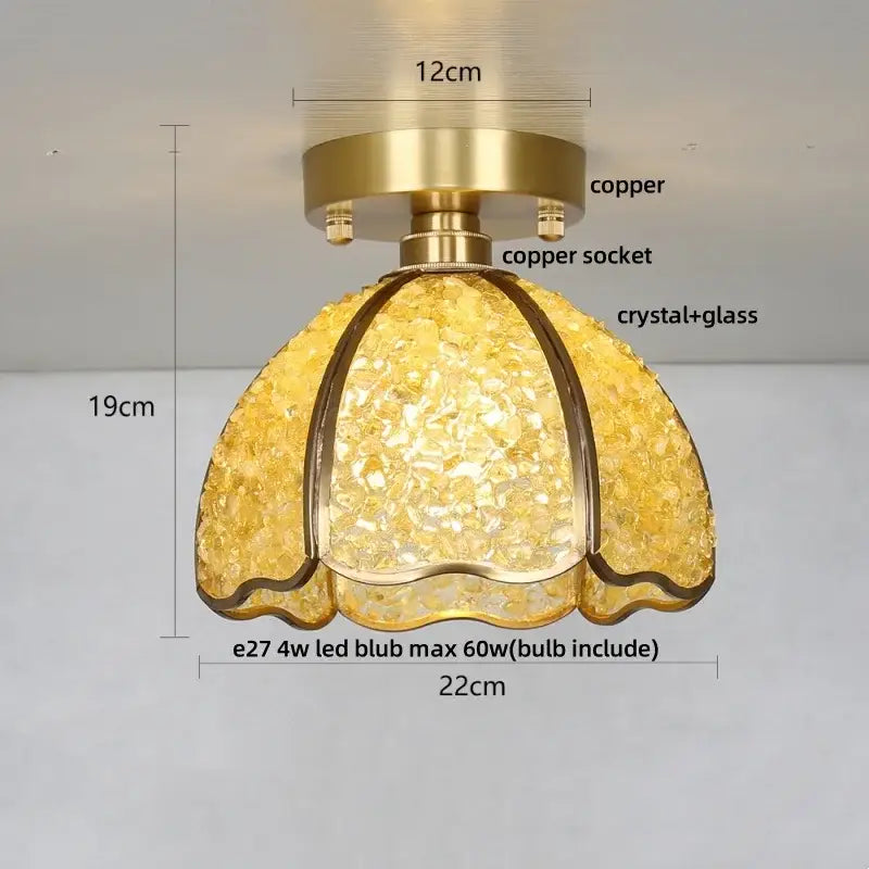 Modern brass and green crystal glass led ceiling light with golden copper finish and textured amber crystal glass shade