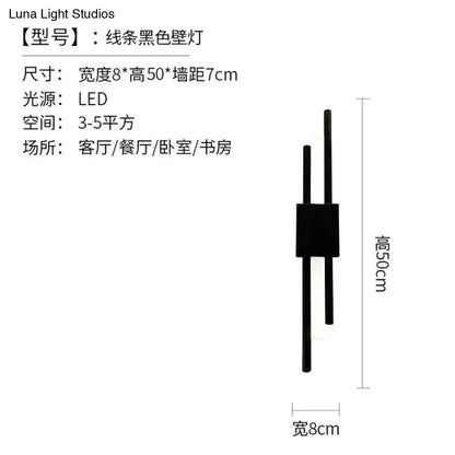 Modern marble led wall lamp featuring a black minimalist design with two vertical rods and a central rectangular base