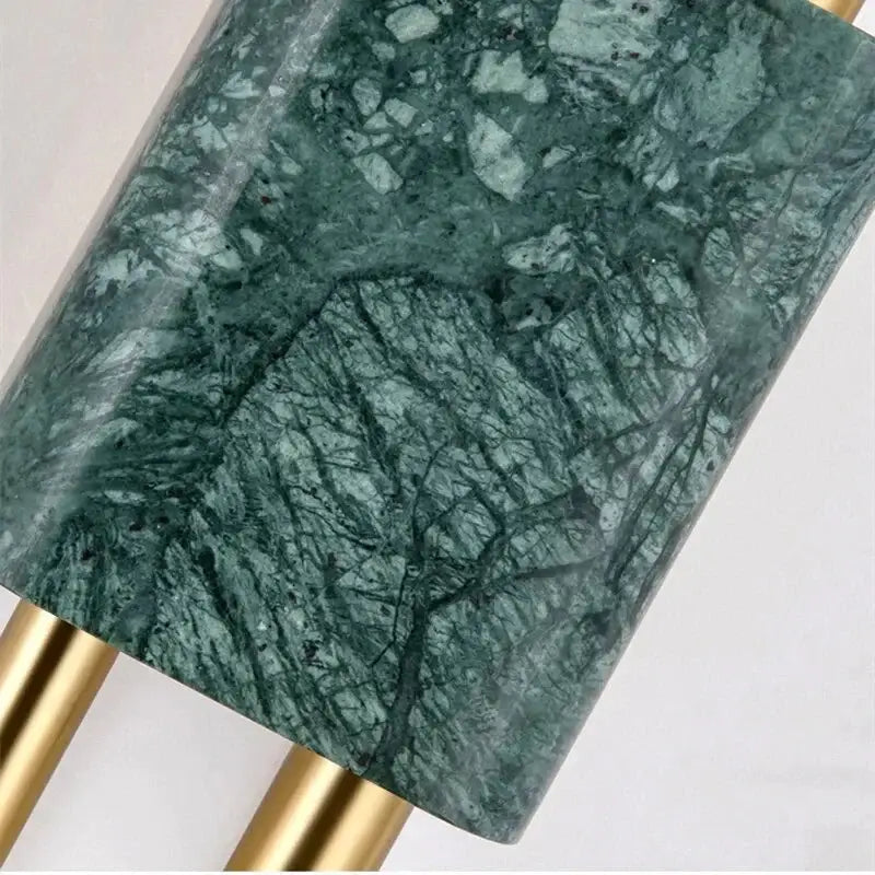 Modern brass and green marble led wall lamp with gold-toned metal base for living room lighting