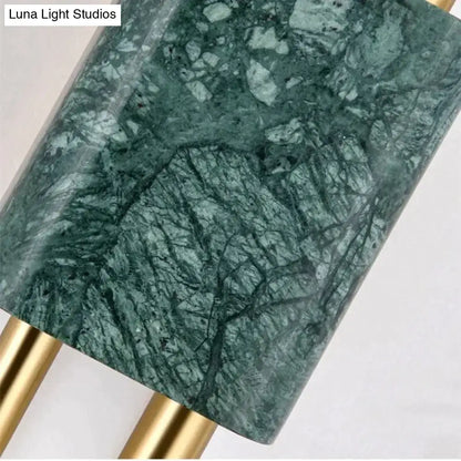 Modern brass and green marble led wall lamp with sleek rectangular marble led base and golden metallic legs for living room