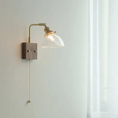 Modern brass wall lights with a clear ribbed glass shade from decorbites clear glass perfect for bedroom sconces decor