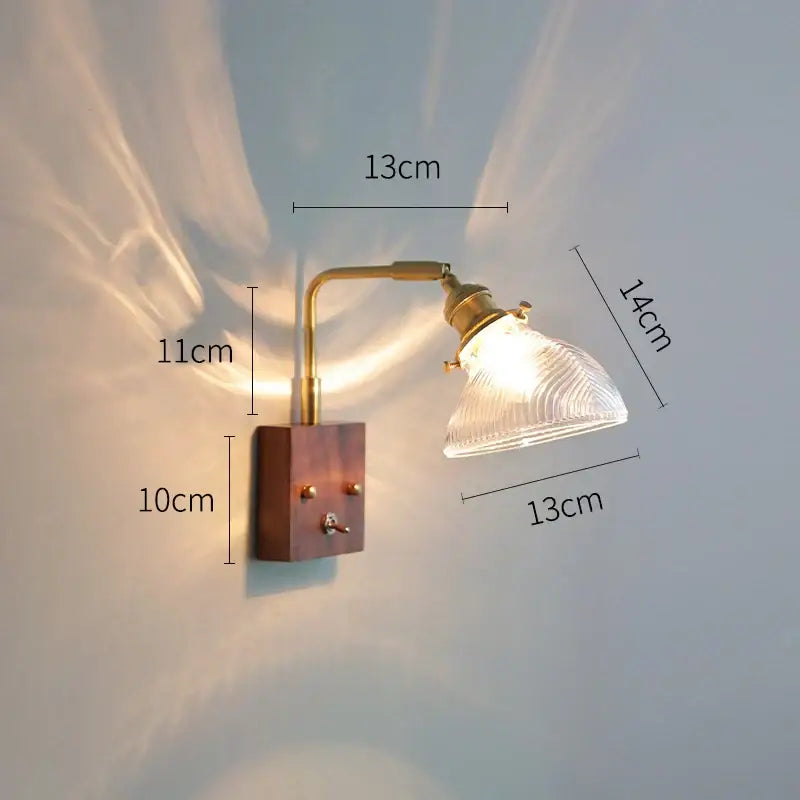 Modern brass wall lights featuring a ribbed clear glass shade ideal for bedroom sconce decorbites clear glass design
