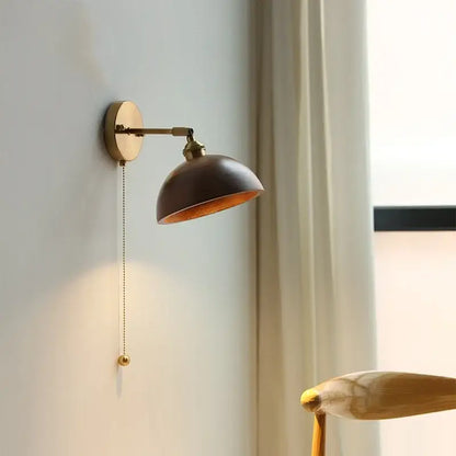 Modern brass and walnut led wall sconce with dark bronze dome shade, adjustable arm, and pull-chain switch for bedroom decorbites led walnut wood lighting