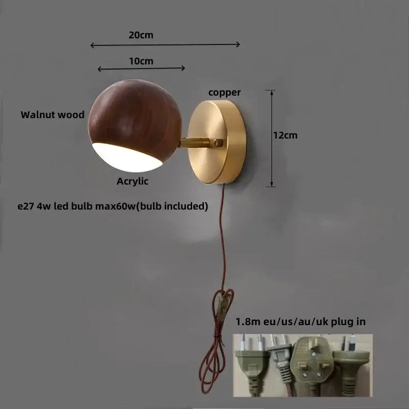 Modern brass and walnut led wall sconce with a spherical acrylic diffuser for bedroom spotlight lighting