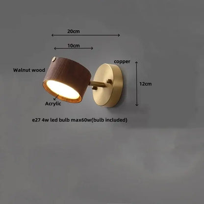 Modern brass and walnut led wall sconce with copper and acrylic lens designed as a bedroom spotlight fixture