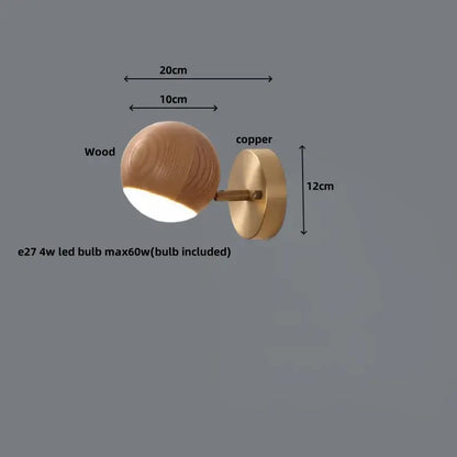 A modern wall sconce with a round wooden shade and copper metal base perfect for living room decorbites led wood base
