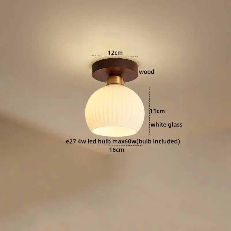 Modern brass and wood led ceiling light featuring a round white frosted glass pendant with brass accents for bedroom decorbites ceiling light