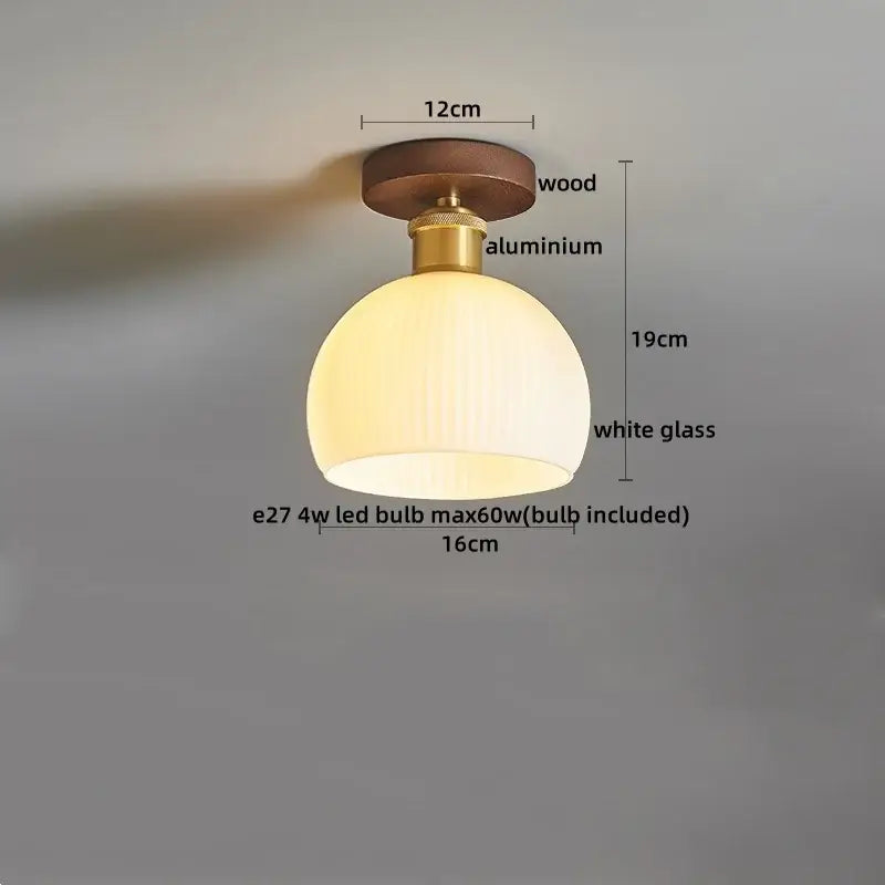 Modern brass and wood led ceiling light with frosted white glass dome and brass aluminum mounting hardware decorbites ceiling light