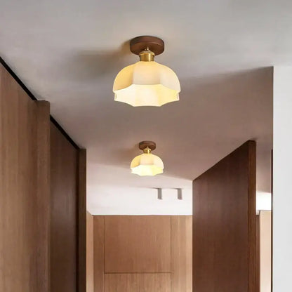 Modern brass and wood led ceiling light with warm-toned frosted glass and wooden mounting plate for bedroom decorbites ceiling light