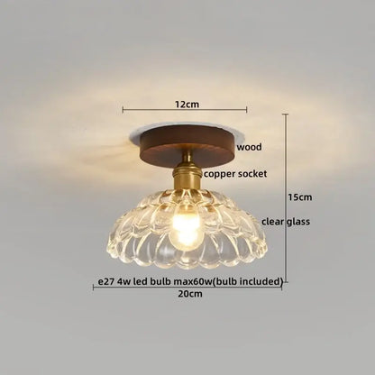 Modern brass and wood led ceiling light with dark wood base, brass socket, and clear intricate glass shade for bedroom decorbites ceiling light
