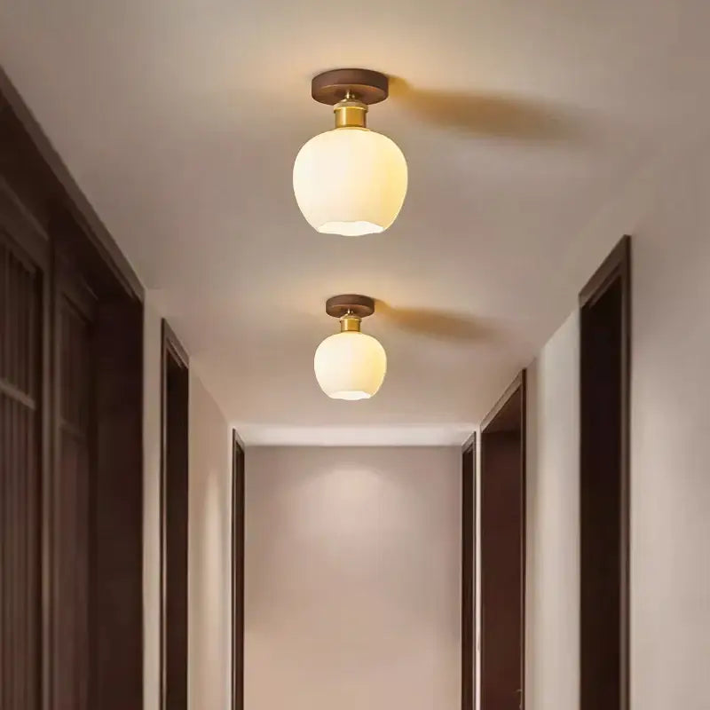 Modern brass and wood led ceiling light with warm-toned spherical frosted glass pendant lights for bedroom decorbites ceiling light