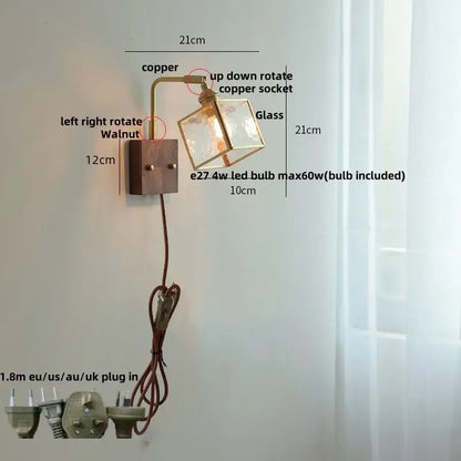 Modern brass and wood led wall lights with copper and walnut sconce and blue glass cube shade for bedroom use