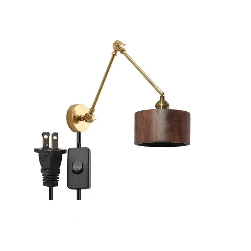 Modern brass and wood led wall sconce with adjustable brass finish and dark wood cylindrical shade for bedroom lighting