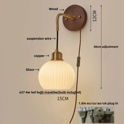 A modern brass and wood ribbed glass wall light with copper adjustable led finish for bedroom decorbites wall light