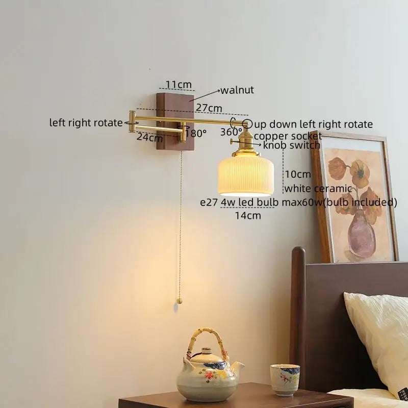 Modern brass and wood wall light with a warm-toned brass arm, walnut mount, and white ceramic copper led lampshade