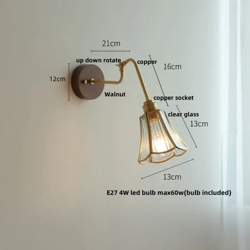 Modern brass and wood wall sconce with copper finish, clear glass shade, amber led, and walnut mounting plate by decorbites copper glass