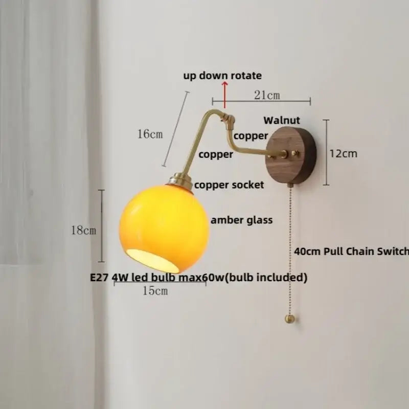 Modern brass and wood wall sconce with amber led glass globe copper arm and walnut wall plate by decorbites copper glass
