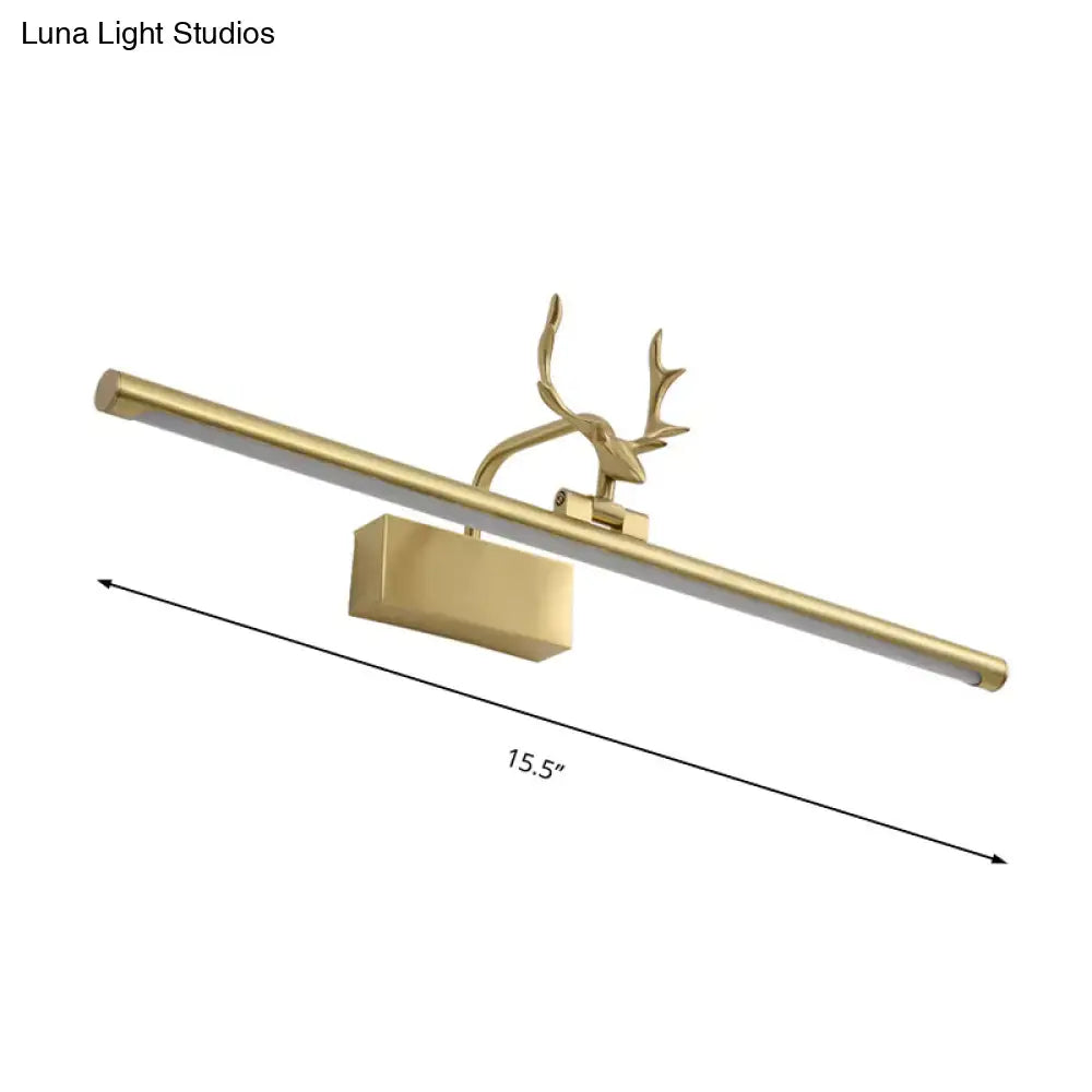 Modern brass antler led wall light with gold-finished deer head and sleek rectangular fixture for bathroom vanity